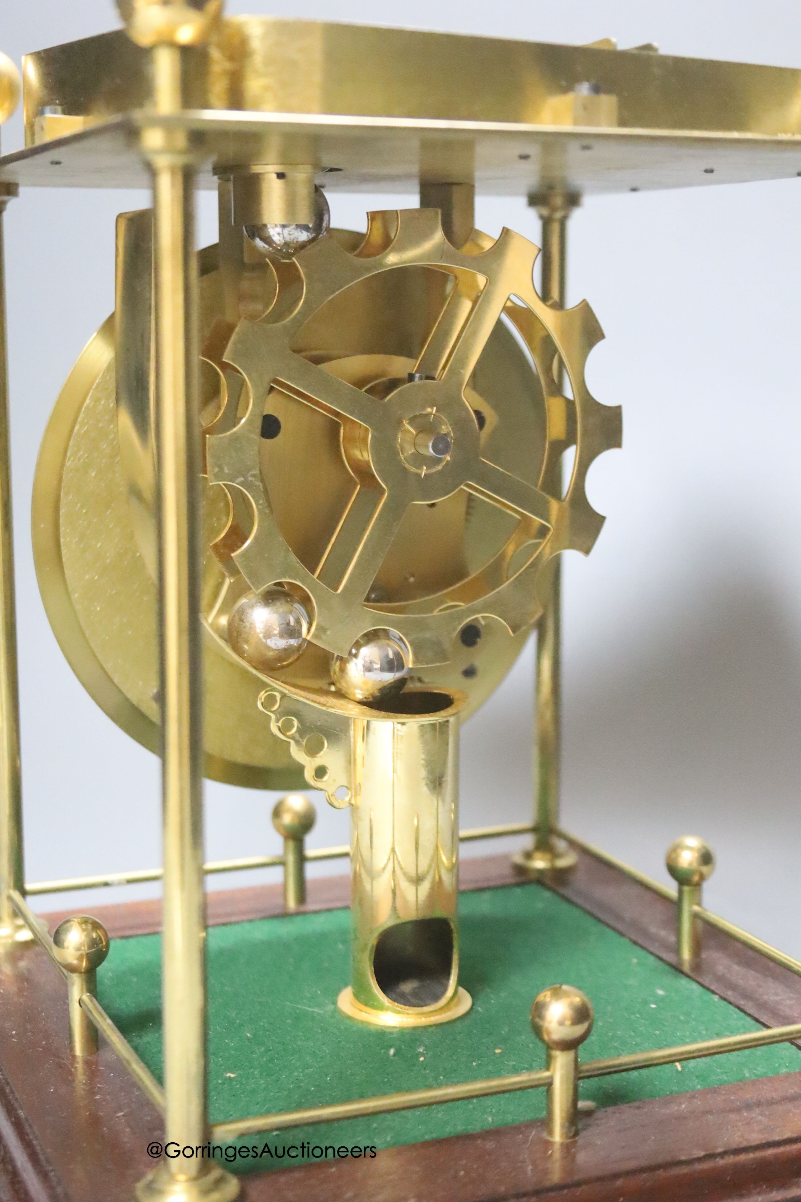 A Thwaites & Reed rolling ball timepiece, height 27cm